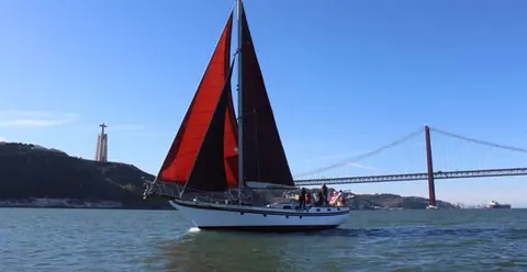 Lisbon: Daylight or Sunset on a Vintage Sailboat