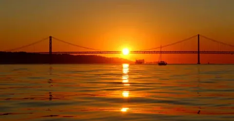 Lisbon: Daylight or Sunset on a Vintage Sailboat