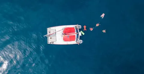 Barcelona: Sunset & Day Catamaran Cruise with Tapas & Drinks